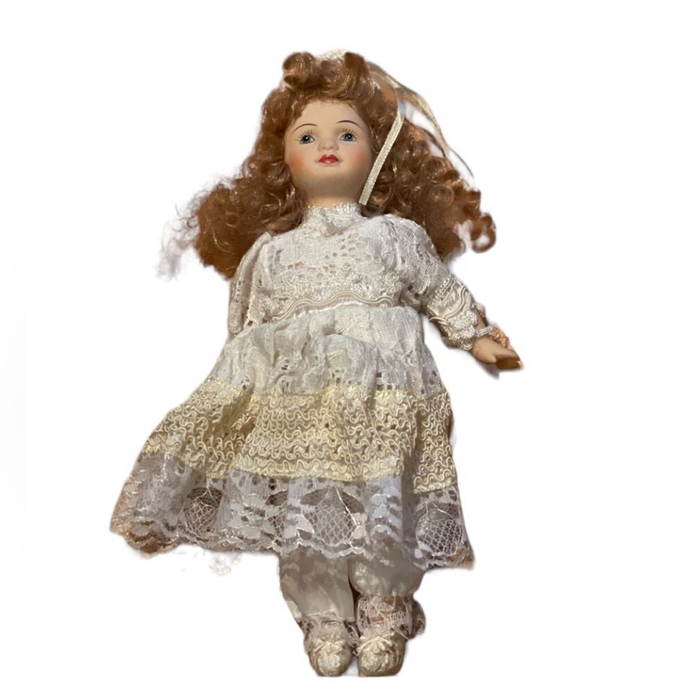 Used porcelain doll from 1990’s.‎